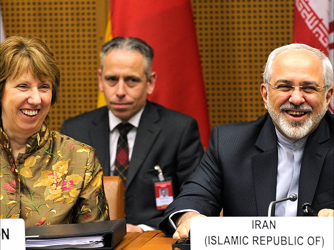 epa04204691 EU High Representative for Foreign Affairs Catherine Ashton (L) and Iranian Foreign Minister Mohammad Javad Zarif (R) smile prior to talks between the E3+3 (France, Germany, UK, China, Russia and US) and Iran, in Vienna,