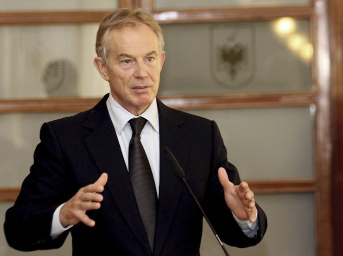 Former British Prime Minister Tony Blair speaks at a news conference alongside Albanian Premier Edi Rama, not seen, in Tirana, Thursday, Oct. 3, 2013. Rama says Blair will assist as an adviser in Albania's efforts to join the 28-nation European Union. (AP Photo/Hektor Pustina)