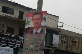 معارضون لنظام الأسد اعتبروا خروج المقترعين بتظاهرات جماعية للتصويت مسرحية مصطنعة