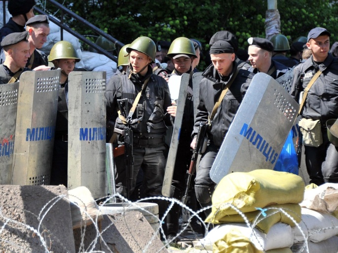 القوات الأوكرانية استعادت مبنى البلدية بماريوبول وطردت منه انفصاليين (الفرنسية/غيتي إيميجز)