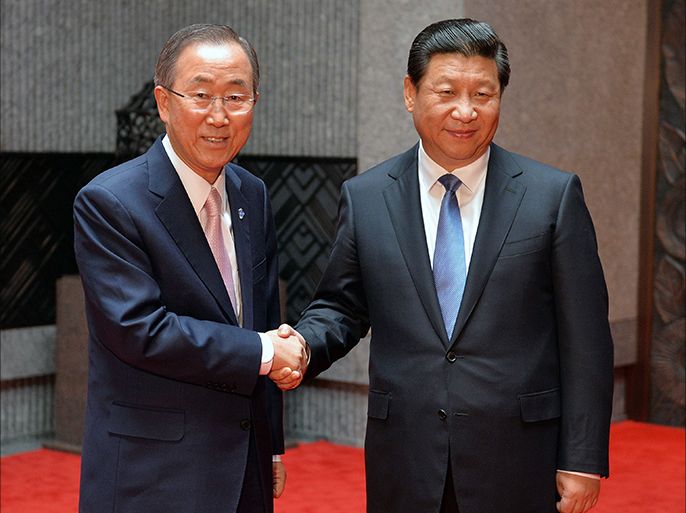 United Nations Secretary-General Ban Ki-moon (L) meets with the Chinese President Xi Jinping (R) at the Xijiao State Guesthouse on the eve of the fourth CICA summit in Shanghai on May 19, 2014.