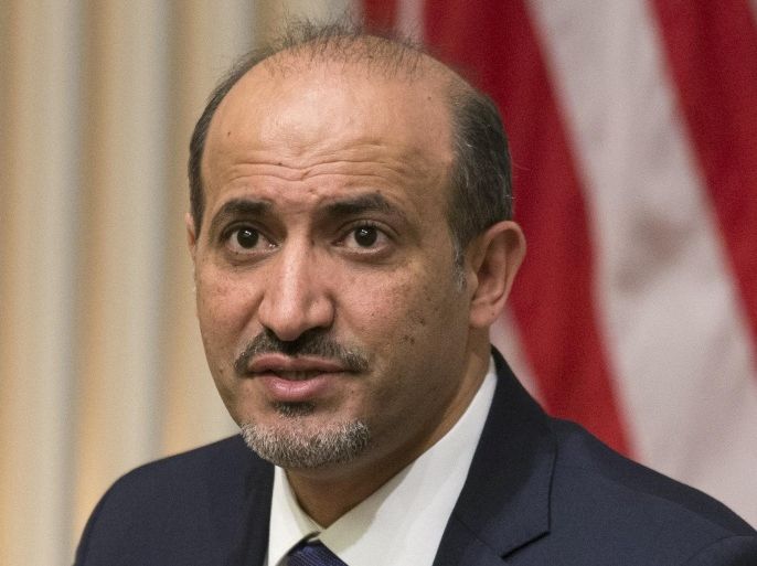 President Ahmad al-Jarba, president of the National Coalition for Syrian Revolutionary and Opposition Forces, speaks at the U.S. Institute of Peace, on Wednesday, May 7, 2014, in Washington. Al-Jarba said that rebel forces need weapons that could “neutralize’’ aerial raids by President Bashar Assad’s air force in order to change the balance of power on the ground and pave the way for a political solution to the crisis. (AP Photo/ Evan Vucci)