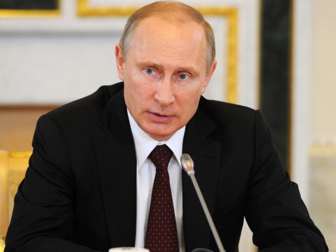 بوتين اتفق مع أوباما على ضرورة البقاء على تواصل بشان الأزمة الأوكرانية (أسوشيتد برس)
