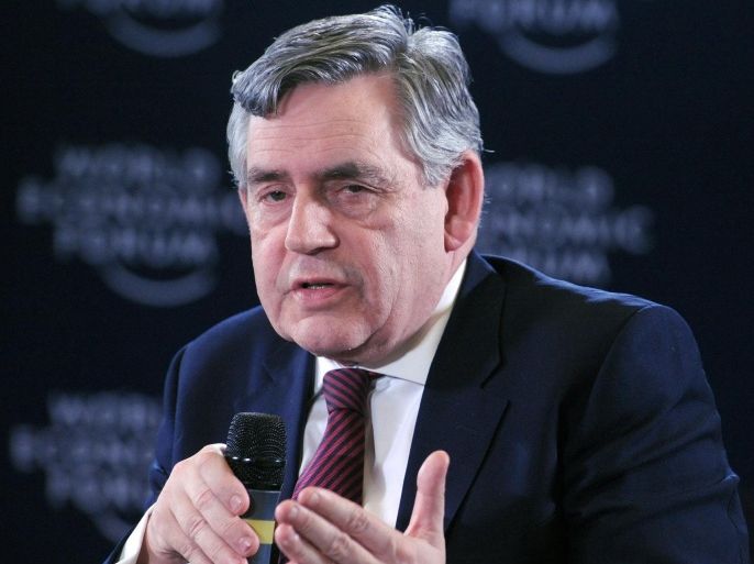 Former British Prime Minister Gordon Brown speaks about 'Safe Schools Initiative' at the World Economic Forum in Abuja on May 7, 2014. The World Economic Forum on Africa kicked off in Abuja today in the shadow of security fears and mounting global concern about the plight of more than 200 schoolgirls abducted by Islamist militants. The showcase regional conference, dubbed 'Africa's Davos', had been meant to turn the spotlight on the host nation, which recently became the continent's largest economy, promote it as a place to do business and reflect its growing global clout. Instead, the build-up has been dominated by the 223 girls still missing after being abducted in the remote northeastern town of Chibok three weeks ago by Boko Haram fighters, who have since threatened to sell them as slave brides. AFP PHOTO/PIUS UTOMI EKPEI