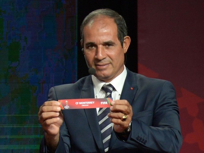 Badou Zaki, former Moroccan goalkeeper and coach, shows the name of Monterrey during the draw for the 2013 Club World Cup in Marrakech on October 9, 2013. Morocco will host this year's tournament with European champions Bayern Munich and Copa Libertadores winners Atletico Mineiro.