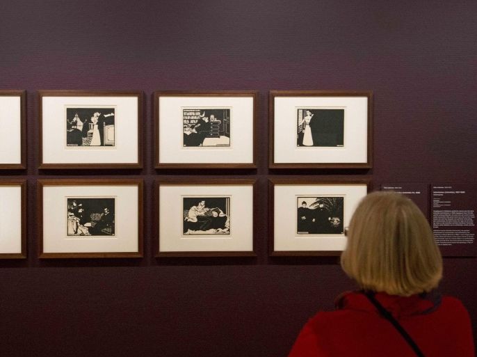 A visitor looks at the newly acquired work 'Intimites' by Swiss artist Felix Vallotton (1865-1925) at the Van Gogh Museum in Amsterdam, The Netherlands, 08 May 2014. The work consists of a series of woodcut prints.