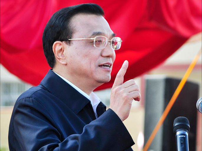 epa04192499 Chinese Prime Minister Li Keqiang delivers a speech during the inauguration ceremony of the Addis Ababa-Adama Expressway in Tulu Dimtu, on the outskirt of the capital Addis Ababa, Ethiopia, 05 May 2014