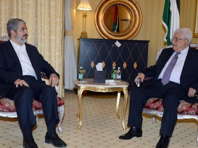 A photograph supplied by the Palestinian Authority shows Palestinian President Mahmoud Abbas (R) meeting with political leader of the Hamas movement, Khaled Meshaal, in Doha, Qatar, 05 May 2014. Abbas and Meshaal are meeting for the first time since the two Palestinian rival movements, Fatah and Hamas, signed an agreement on 23 April to form a unity government and hold general elections. EPA/THAER GHANAIM/PALESTINIAN AUTHORITY/HANDOUT