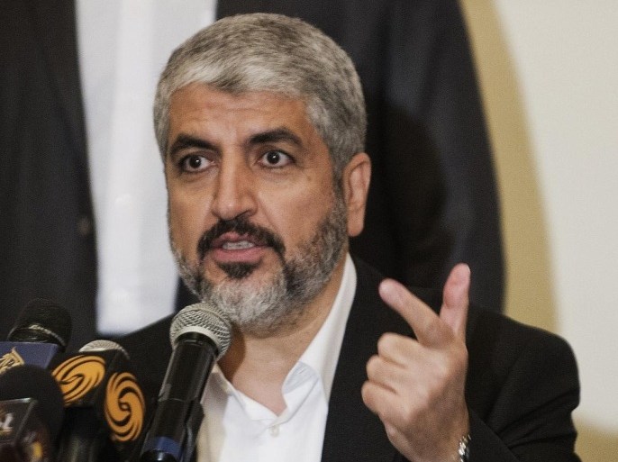 Newly elected Hamas political leader Khaled Meshaal speaks at political conference on Palestine on April 4, 2013 in Cairo. Meshaal's reelection as head of the Islamist Hamas movement was officially confirmed on April 2, drawing a cautious welcome from the rival Fatah movement which rules the West Bank.