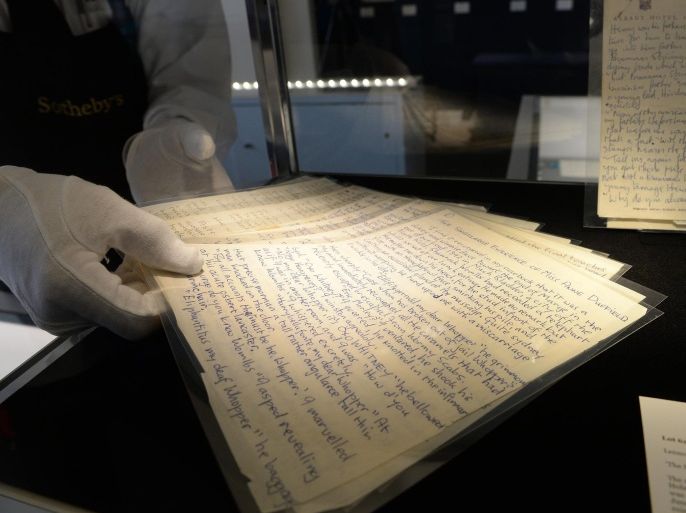 'The Singularge Experience of Miss Anne Duffield' an original manuscript by John Lennon, estimated at 70,000 USD, is on display at Sotheby's in New York May 29, 2014. An important collection of John Lennon drawings and manuscripts from 1964-1965 ranging from estimates of 500 USD to 70,000 USD, is set to go on auction on June 4, 2014. AFP PHOTO/Emmanuel Dunand 'MANDATORY MENTION OF THE ARTIST UPON PUBLICATION'