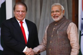Indian Prime Minister Narendra Modi, right, shakes hand with his Pakistani counterpart Nawaz Sharif before the start of their meeting in New Delhi, India, Tuesday, May 27, 2014. Analysts say Sharif's visit could signal an easing of tensions between the often-hostile, nuclear-armed neighbors. No details were given about what the two men would discuss, but Modi is likely to ask Pakistan to hasten investigations into the Mumbai attack and put its perpetrators on trial. (AP Photo/Saurabh Das)