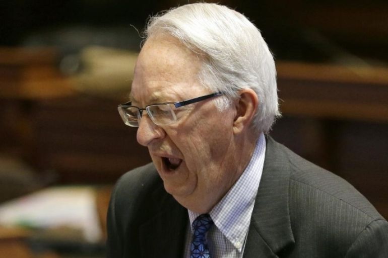 Sen. Dennis Black, D-Grinnell, lets out a yawn as he talks with Sen. Bill Dotzler, D-Waterloo, left, on the floor of the Senate, Thursday, May 1, 2014, at the Statehouse in Des Moines, Iowa. The Iowa Senate, after working all night to finish the 2014 legislative session, must return for one more day after a dispute developed involving subpoena powers. (AP Photo/Charlie Neibergall)