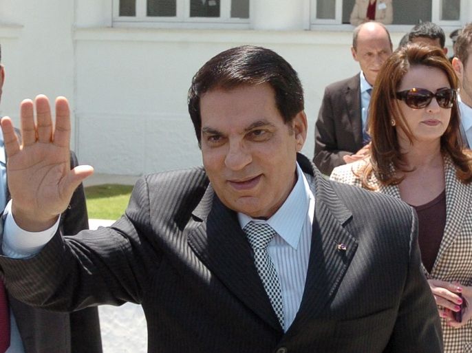 Tunisian President Zine El Abidine Ben Ali (front) waves to wellwishers after voting for the municipal elections next to his wife Leila (C) and his son-in-law the Tunisian businessman Sakhr Materi (R) on May 9, 2010 in Tunis. Polls opened in Tunisia on May 9, 2010, for municipal elections in which the ruling party of long-time President Zine El Abidine Ben Ali is widely tipped to come out victorious.