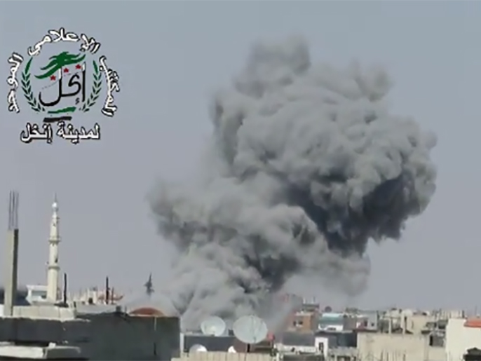 صورة بثها ناشطون لغارة من قوات النظام على إنخل بريف درعا