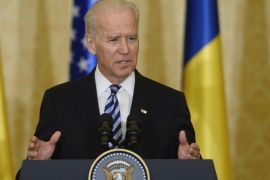 US Vice President Joe Biden gestures while delivering a speech at the end of his official visit in Romania, in Bucharest, Wednesday, May 21, 2014. On a two-day official visit to Romania, U.S. Vice President Joe Biden on Tuesday called on European allies to stand firm in punishing Russia for its role in the unrest in neighboring Ukraine and its annexation of Crimea.(AP Photo/Octav Ganea, Mediafax) ROMANIA OUT