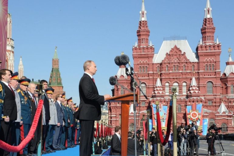 Russian President Vladimir Putin (C) delivers a speech during a military parade marking the 69th anniversary of the victory over the Nazi Germany in the WWII in the Red Square in Moscow, Russia 09 May 2014. EPA/MIKHAIL KLIMENTYEV / RIA NOVOSTI / KREMLIN POOL MANDATORY CREDIT