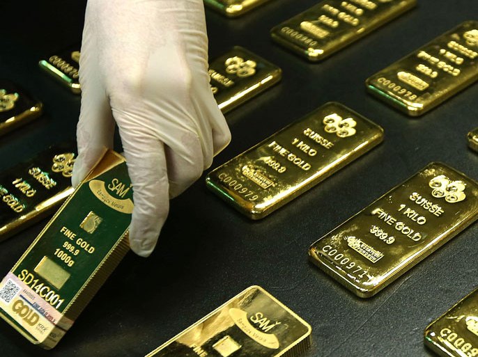 epa04134424 Gold bars with 99.99 percent purity are stored at a depository of the South Korea Exchange in Seoul, South Korea, 21 March 2014. The bourse operator said it will launch a gold trading platform next week to properly tax the gold market. EPA/YONHAP SOUTH KOREA OUT