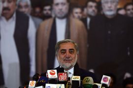 Afghan presidential candidate Abdullah Abdullah gestures during an election gathering in Kabul on May 22, 2014. Afghan presidential candidates Abdullah Abdullah and Ashraf Ghani will compete in the run-off on June 14 to determine who leads Afghanistan into a new era without the assistance of NATO combat troops to help fight the Taliba
