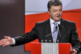Ukrainian presidential candidate Petro Poroshenko speaks during his press conference in Kiev, Ukraine, Sunday, May 25, 2014. An exit poll showed that billionaire candy-maker Petro Poroshenko won Ukraine's presidential election outright Sunday in the first round — a vote that authorities hoped would unify the fractured nation. (AP Photo/Mykola Lazarenko, Pool)