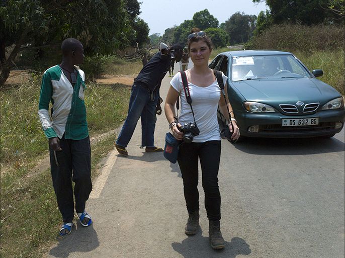 Picture taken in Damara, 70km north from Bangui, on February, 21, 2014 of French journalist Camille Lepage. French journalist Camille Lepage, 26, has been killed while on a reporting assignment in Central African Republic, French President Francois Hollande said on May 13, 2014 in a statement, vowing to make every effort to shed light on the murder. "The body of Miss Lepage was found by a patrol of Sangaris troops while checking a vehicle driven by anti-Balaka militia in the region of Bouar" in west of the country, it said, referring to militamen from the mainly Christian vigilante group. AFP PHOTO / FRED DUFOUR