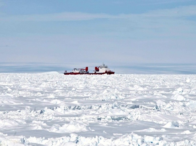 The Xue Long (Snow Dragon) Chinese icebreaker, as seen from Australia's Antarctic supply ship, the Aurora Australis, sits in an ice pack unable to get through to the MV Akademik Shokalskiy, in East Antarctica, some 100 nautical miles (185 km) east of French Antarctic station Dumont D'Urville and about 1,500 nautical miles (2,800 km) south of Hobart, Tasmania, January 2, 2014, in this handout courtesy of Fairfax's Australian Antarctic Division. REUTERS/Fairfax/Australian Antarctic Division/Handout via Reuters