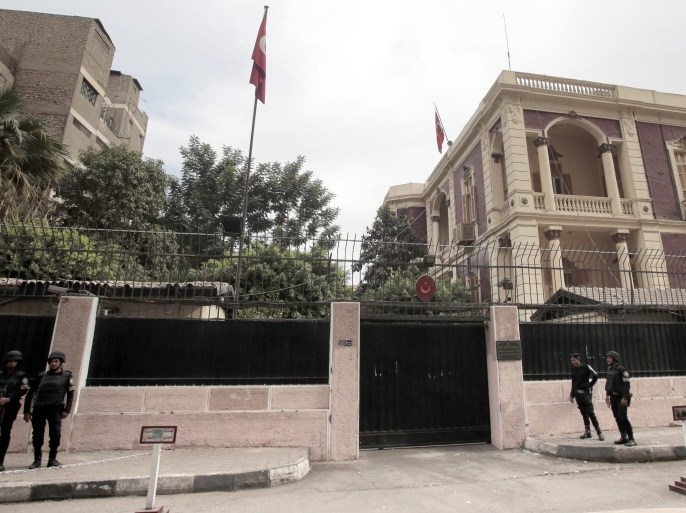 Egyptian policemen keep watch outside the Turkish embassy in Cairo, Egypt, 23 November 2013. Egypt said it will expel the Turkish ambassador in Cairo for repeated comments from Ankara supporting ousted Egyptian president Mohammed Morsi, Foreign Ministry spokesman Badr Abdel-Atti said on 23 November 2013. He said repeated statements by Turkish Prime Minister Recep Tayyip Erdogan calling for the release of Morsi reflect 'an unacceptable determination to defy the will of the Egyptian people ... and interference in the internal affairs of the country.'