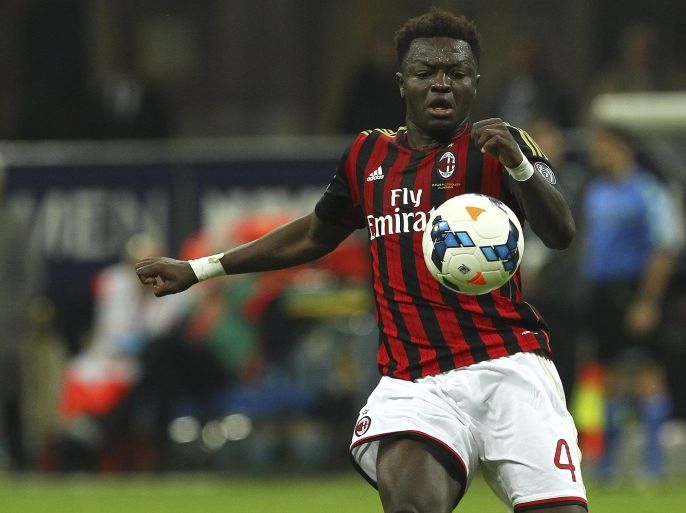 MILAN, ITALY - MARCH 29: Sulley Ali Muntari of AC Milan in action during the Serie A match between AC Milan and AC Chievo Verona at San Siro Stadium on March 29, 2014 in Milan, Italy.