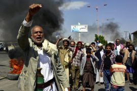 Angry protesters shout slogans after they set tires on fire in a street during a protest against a blackout and a shortage of fuel supplies in Sana'a, Yemen, 11 June 2014. Reports state that Yemen is facing severe fuel shortages for weeks and a total blackout for two days due to repeated attacks by insurgents and armed tribesmen on a major pipeline and key power lines.