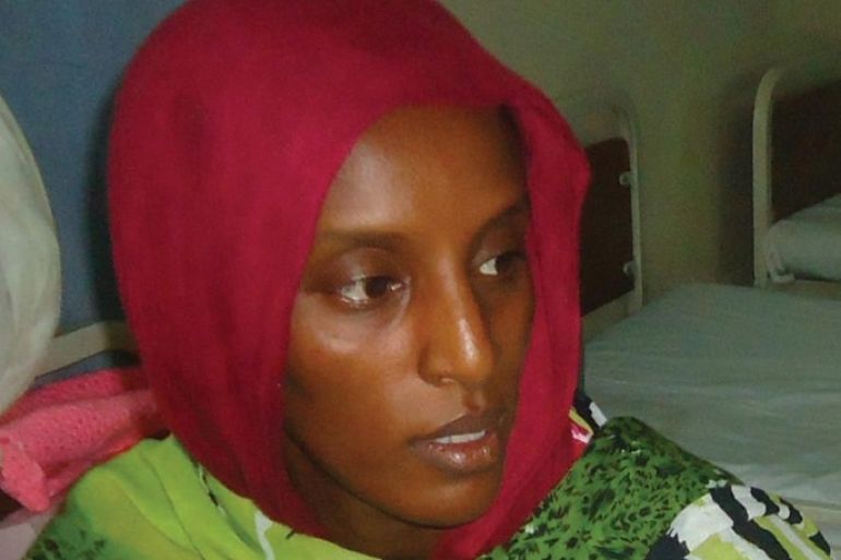 Meriam Yahia Ibrahim Ishag, a 27-year-old Christian Sudanese woman sentenced to hang for apostasy, sits in her cell a day after she gave birth to a baby girl at a women's prison in Khartoum's twin city of Omdurman on May 28, 2014. Sudan denied on June 1, 2014 Ishag would be freed soon, saying quotes attributed to a foreign ministry official had been taken out of context. AFP PHOTO / STR
