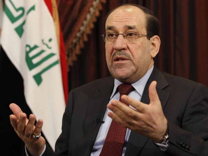 FILE - In this Dec. 3, 2011, file photo, Iraq's Shiite Prime Minister Nouri al-Maliki talks during an interview with The Associated Press in Baghdad, Iraq. As a Sunni Muslim insurgency gains ground in Iraq, the United States is pondering whether the violent march could be slowed with new leadership in Baghdad after years of divisive policies. But with no obvious replacement for al-Maliki, and no apparent intent on his part to step down, Washington is largely resigned to continue working with him for a third term as Iraq’s premier. (AP Photo/Hadi Mizban, File)