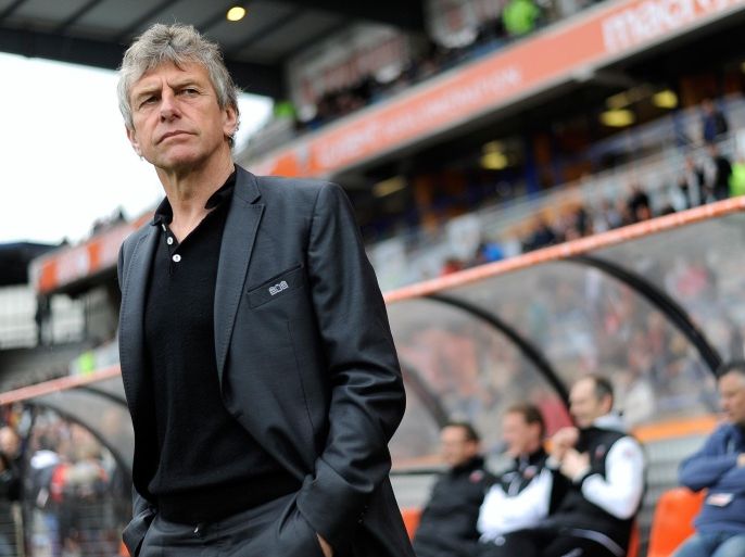 Lorient's French head coach Christian Gourcuff looks on before the French L1 football match between FC Lorient and Montpellier Herault Sport Club (MHSC) on April 20, 2014, at the Moustoir stadium in Lorient, western France. AFP PHOTO / JEAN-SEBASTIEN EVRARD