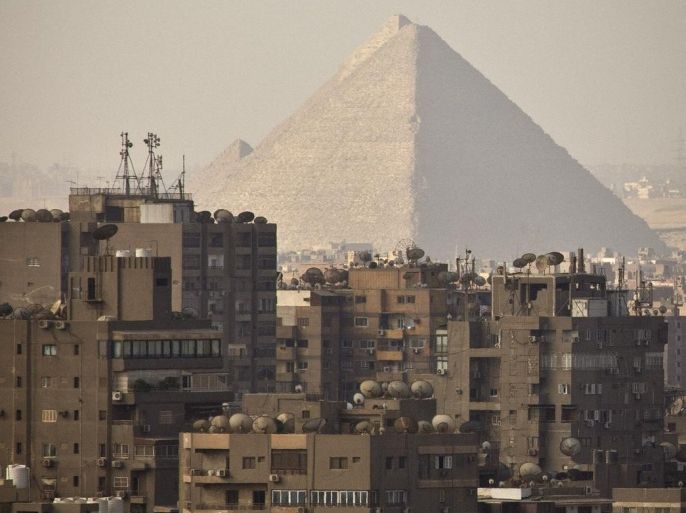 The Giza Pyramids dominate the skyline in Giza, Egypt, Cairo's sister city, Friday, Oct. 18, 2013. Supporters of ousted President Mohammed Morsi held demonstrations around the country to protest against the military-backed interim government and its crackdown on the Muslim Brotherhood. Security, already volatile since 2011, has worsened since the military overthrew Morsi following mass protests calling for his resignation.
