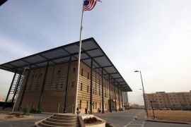 A U.S. flag flies in front of the Annex I building inside the compound of the U.S. embassy in Baghdad December 14, 2011. The compound, located in Baghdad's Green Zone, will be the home for thousands of American citizens left after the U.S. military completes its withdrawal this month.
