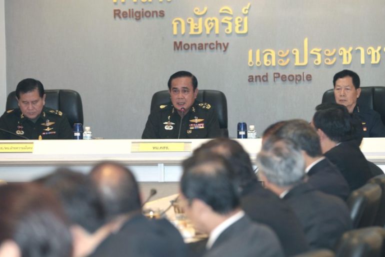 Thai army chief and junta head General Prayuth Chan-ocha (C) talks during a meeting regarding the national situation at the Royal Thai Army headquarters in Bangkok, Thailand, 11 June 2014. Chan-ocha held a meeting with Thai ambassadors and consuls-general deployed in 21 countries to clarify the Thai situation abroad, after the military coup on 22 May 2014.