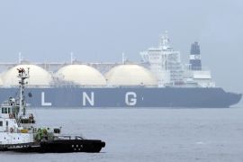 Liberian LNG tanker Al Hamra arrives at a port in Yokohama, southwest of Tokyo, Monday, April 21, 2014. Japan's trade deficit surged nearly 70 percent to a record 13.75 trillion yen ($134 billion) in the last fiscal year as exports failed to keep pace with surging costs for imported oil and gas. (AP Photo/Koji Sasahara)