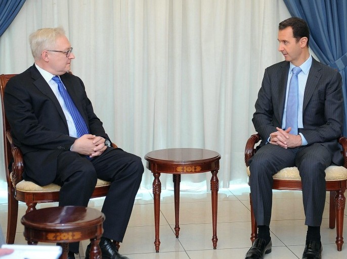 A handout picture made available by Syrian Arab news agency SANA shows Syrian president Bashar Assad (R) meets with Sergei Ryabkov (L), deputy Russian foreign minister in Damascus, Syria, 28 June 2014. According to media reports, Ryabkov called on the United States and Europe to take 'serious' steps to combat terrorism, warning that the wave of terrorism is spiraling and is threatening a number of regional countries. Ryabkov said that 'joint efforts are the only way to solve the problem of terrorism', warning that Russia will not remain 'having its hands tied to its backs towards terrorist groups'. EPA/SANA / HANDOUT