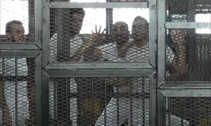 "تأجيل محاكمة صحفيي الجزيرة في مصر"، والمصدر الجزيرة