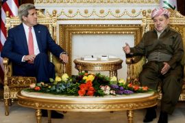 Kurdish regional President Massoud Barzani, right, speaks during a meeting with U.S. Secretary of State John Kerry at the presidential palace in Irbil, Iraq, Tuesday, June 24, 2014. Kerry arrived in Iraq's Kurdish region in a US diplomatic drive aimed at preventing the country from splitting apart in the face of militants pushing towards Baghdad. (AP Photo/Brendan Smialowski, Pool)