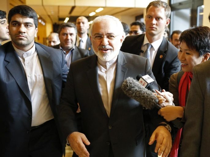 Iranian Foreign Minister Mohammad Javad Zarif (C) arrives at the Austria Center Vienna to talk only to the Iranian media after another round of the so called EU 5+1 Talks with Iran in Vienna, on June 20, 2014. Iran and six world powers wrapped up Friday a fifth round of nuclear talks having started to draft an accord, and will meet again on July 2, the EU said. AFP PHOTO / DIETER NAGL
