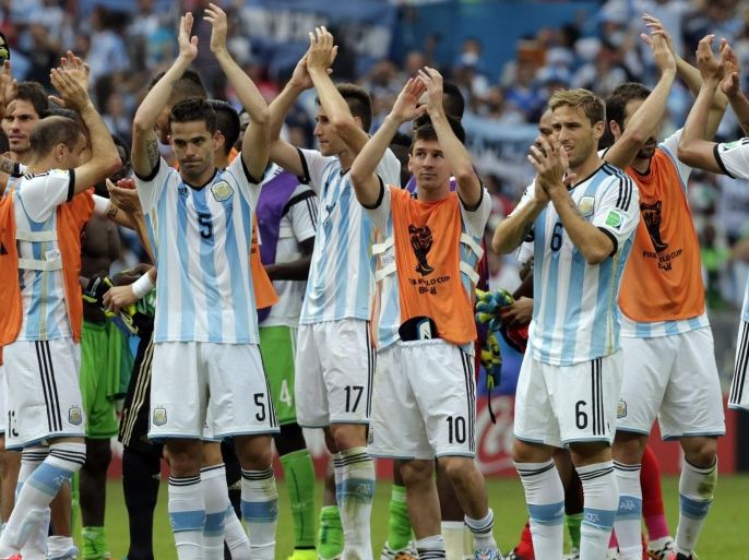 Argentina players acknowledge their fans at the end of the group F World Cup soccer match between Nigeria and Argentina at the Estadio Beira-Rio in Porto Alegre, Brazil, Wednesday, June 25, 2014. Argentina won 3-2. (AP Photo/Fernando Vergara)