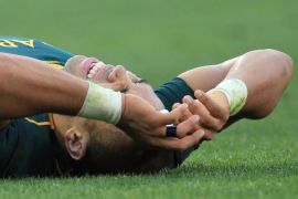 South Africa's Bryan Habana, grimaces after pulling a hamstring during their Rugby Championship match against New Zealand at Ellis Park Stadium in Johannesburg, South Africa, Saturday, Oct. 5, 2013. (AP Photo/Themba Hadebe)