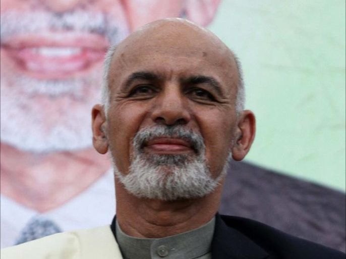 Afghan presidential candidate Ashraf Ghani attends an election campaign in Herat, Afghanistan, 30 May 2014. The election for a new president in Afghanistan will go to a run-off vote in June, the election commission said on 15 May, after no candidate received the majority of votes needed to win outright. أشرف غني