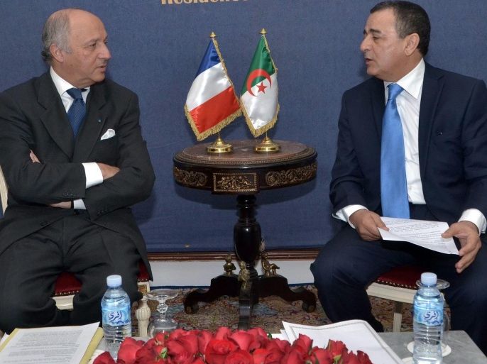 French Foreign Minister Laurent Fabius (L) speaks with Algerian Minister of Industry and Mines, Abdeslam Bouchouareb (R) during their meeting in Algiers, Algeria, 09 June 2014. Fabius is Algier to improve the countries' relations.
