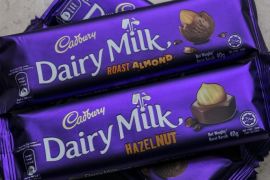 A Hazel Nut (bottom) and Roast Almond Cadbury Dairy Milk bar are are placed on a table in Kuala Lumpur, Malaysia, 28 May 2014. More than a dozen Muslim organizations urged a boycott 27 May against chocolate-maker Cadbury after two of its products sold in predominantly Islamic Malaysia were found to contain pork DNA. Cadbury's Malaysia recalled two batches of Cadbury Dairy Milk Hazelnut and Cadbury Dairy Milk Roast Almond, which the Health Ministry found on to contain traces of porcine DNA.