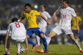 SAO PAULO, BRAZIL - JUNE 06: Neymar (C) of Brazil and Matic (R) and Radosav Petrovic of Serbia compete for the ball during the International Friendly Match between Brazil and Serbia at Morumbi Stadium on June 06, 2014 in Sao Paulo, Brazil.