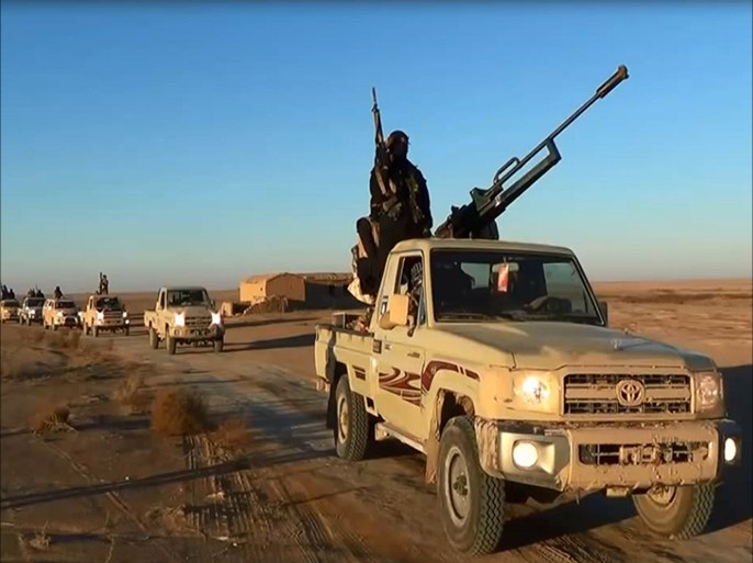 An image grab taken from a propaganda video uploaded on June 11, 2014 by jihadist group the Islamic State of Iraq and the Levant (ISIL) allegedly shows ISIL militants driving at an undisclosed location in Iraq's Nineveh province. Militants took control of the Iraqi city of Tikrit and freed hundreds of prisoners today, police said, the second provincial capital to fall in two days. AFP PHOTO / HO / ISIL