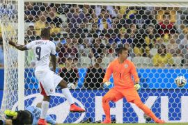 Costa Rica's Joel Campbell scores his side's first goal during the group D World Cup soccer match between Uruguay and Costa Rica at the Arena Castelao in Fortaleza, Brazil, Saturday, June 14, 2014.(AP Photo/Bernat Armangue)