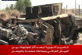 كاميرا الجزيرة ترصد آثار المواجهات في الموصل