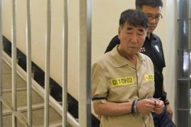 Lee Joon-seok, the captain of the sunken South Korean ferry Sewol, arrives at Gwangju District Court in Gwangju, South Korea, Tuesday, June 10, 2014. Fifteen crew members from the sunken South Korean ferry were in court to enter pleas on charges that they were negligent and failed to save passengers in the disaster, which left more than 300 people dead or missing. (AP Photo/Yonhap, Hyung Min-woo) KOREA OUT