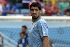 Uruguay's forward Luis Suarez looks on prior to a Group D football match between Italy and Uruguay at the Dunas Arena in Natal during the 2014 FIFA World Cup on June 24, 2014. AFP PHOTO/ DANIEL GARCIA